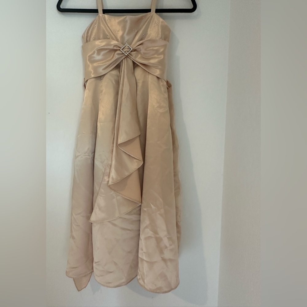 Beautiful girl dress satin in beige